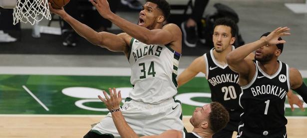 爱游戏入口-篮网稳守主场，防守大战战胜雄鹿稳居前列